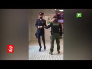 the security guard knocked out the eccentric who came to the store in high heels in a suit of a railway worker